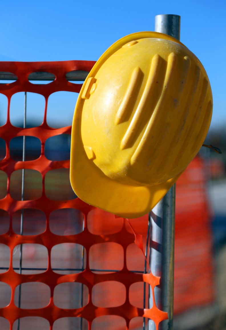 hard hat on the road construction site and a safety net | BIS Safety ...