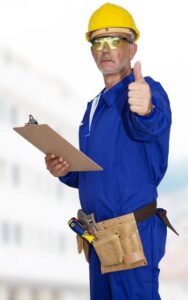 builder or senior mason making ok sign with thumb