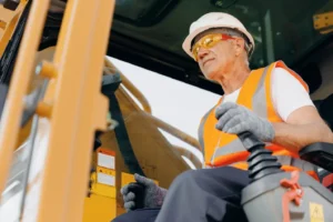 Excavator in use on a worksite, emphasizing proper safety practices and operations.