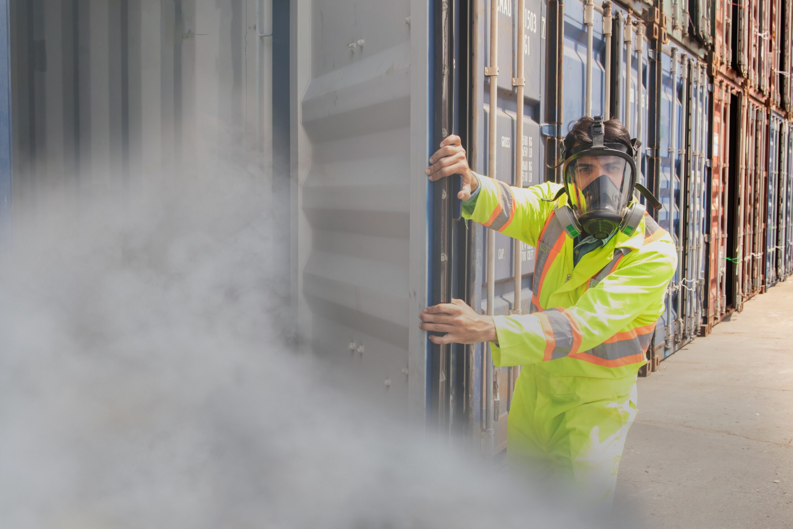 Illustration showing invisible gas particles being inhaled, representing unseen workplace gas hazards.