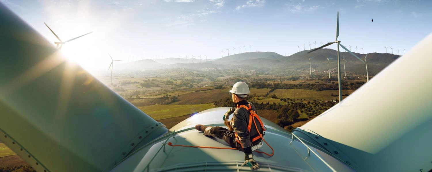 Wind Turbine Technician Working With Safety